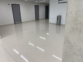 Faculty corridor with a floor featuring white light lines