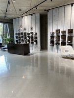 Retail space with shelving on light terrazzo flooring